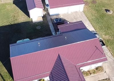 metal roofing on a house, shed, and garage